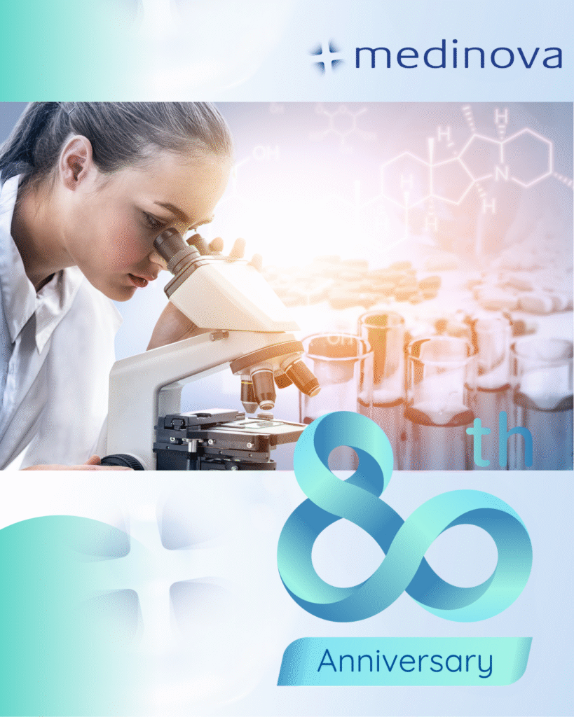 A scientist looks into a microscope